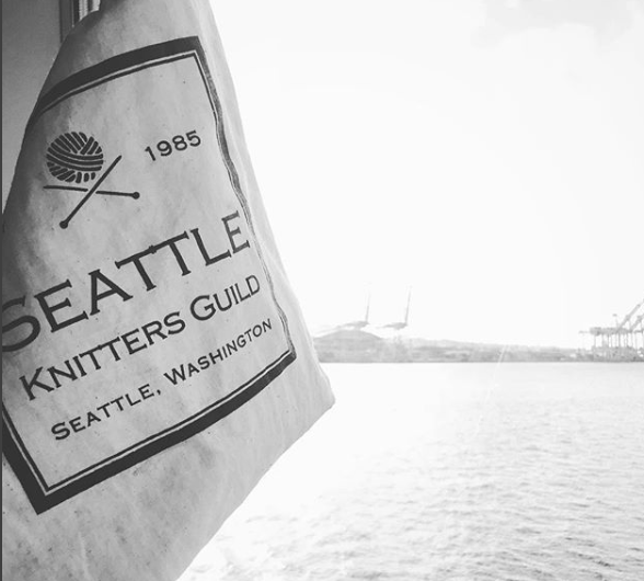 Cotton drawstring bag with Seattle Knitters Guild Logo